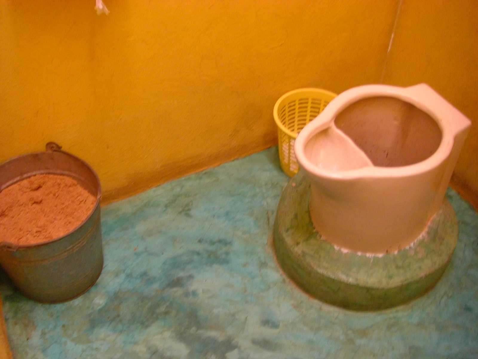 CIMG13
46 toilet with bucket of sawdust
